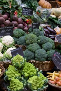 Vibrant display of fresh vegetables at a local farmer's market, showcasing seasonal produce.